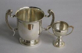A George V silver two handled loving cup, Blackmore & Fletcher Ltd, London, 1919 and a small