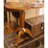 An elm tripod table W.66cm