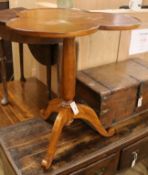 An elm tripod table W.66cm