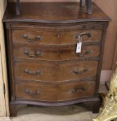 A mahogany serpentine chest of four drawers with a brushing slide W.71cm