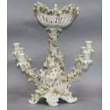 A German floral and putti encrusted centrepiece height 48.5cm