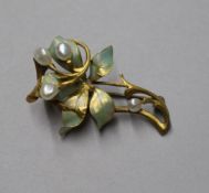 A yellow metal, enamel and pearl openwork spray brooch, 43mm.