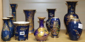 Carlton Ware mottle blue pottery - nine vases and a candlestick, Mikado and other patterns tallest