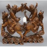 A pair of Chinese carved warriors on horseback height 44cm