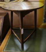 A small early 18th century oak cricket table W.60cm