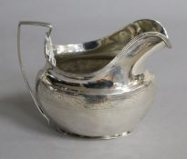 A George III silver cream jug, TL, Sheffield, 1807, 9.5cm, 3 oz.