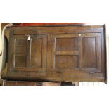 A two door oak corner cupboard W.107cm