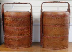 A pair of Chinese metal mounted red lacquer sectional picnic boxes W.49cm