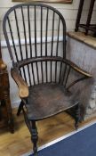 An early 19th century ash and elm Windsor chair