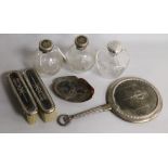 A pair of silver and tortoiseshell pique mounted glass scent bottles, with matching hand mirror, a