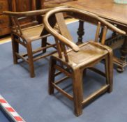 A set of four Chinese horseshoe shaped chairs