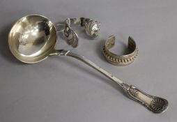 An American silver shell-pattern soup ladle, Makers R & W Wilson, Philadelphia and two white metal