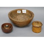 Three Treen turned wood bowls and a coconut cup, dated 1899 bowl diameter 22.5cm