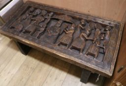 A heavy carved coffee table W.122cm