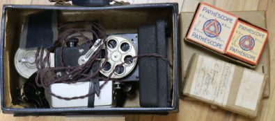 A Pathescope projector and six reels