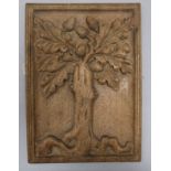 An early 18th century oak panel, carved with an oak tree and acorns 33 x 24cm