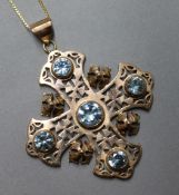 A Coptic cross pendant set with five synthetic spinels?, with 18ct suspension on 18ct gold chain.