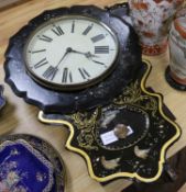 A Continental papier mache wall clock length 72cm