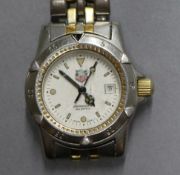 A ladies steel and gold plated TAG Heuer wrist watch