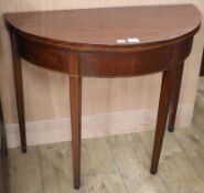 A George III mahogany tea table W.92cm