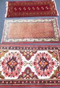 Three small Persian rugs 137 x 175cm 125 x 65cm and 130 x 61cm