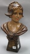 A pottery bust of Loulou, signed F.Giti height 45cm