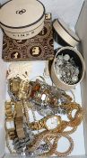 An assortment of costume jewellery and ten wristwatches