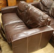 A two seater leather sofa W.160cm
