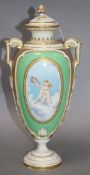 A Royal Worcester 'cherub' vase and cover height 34cm