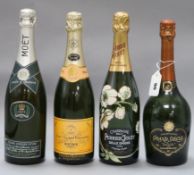 Four bottles of champagne -Perrier Jouet Belle Epoque 1996, Moet & Chandon Silver Jubilee 1977,