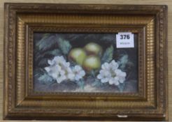 English School c.1910, oil on card, still life of fruit and flowers, 14 x 24cm