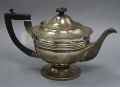 A silver teapot by MH & Co. Ltd, Sheffield 1923