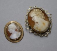 Two Italian yellow metal mounted cameo brooches, largest 53mm.