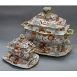 A Mason's ironstone soup tureen, cover and stand and a matching sauce tureen, cover and stand