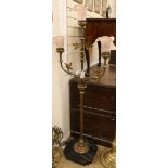 A late 19th century brass Ecclesiastical 3 light candelabrum, fitted with later pink glass shades