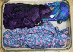 A purple silk dress, Indian dress and two other dresses