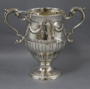 An 18th century Irish silver loving cup, with laurel swag and fluted decoration, hibernia and