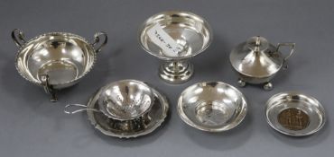 A George V silver table lighter, two trinket bowls, two white metal trinket dishes and a plated