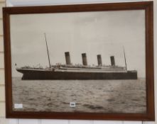 A large vintage photograph of the Titanic signed by "Beken and Son Cowes" 57 x 80cm