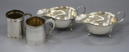 A George V silver christening can, Chester 1910, a plainer christening can and a pair of Mappin &