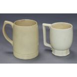 Two pieces of Wedgwood by Keith Murray - a creamer and a mug tallest 12cm