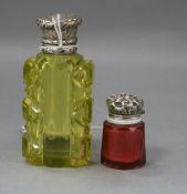 Two late Victorian / Edwardian silver mounted glass scent bottles