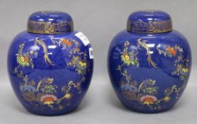 A pair of Wilton ware blue ground chinoiserie painted vases and cover overall height 20cm