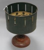 A zoetrope with six printed paper panels height 20.5cm