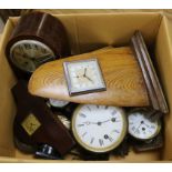 A box of assorted clocks