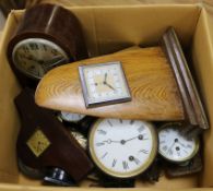 A box of assorted clocks