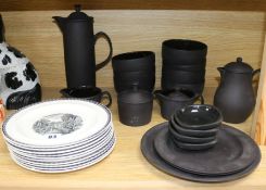 A black 1960's basalt part breakfast set and plates tallest 26cm