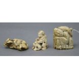 A Japanese staghorn buffalo netsuke and two others