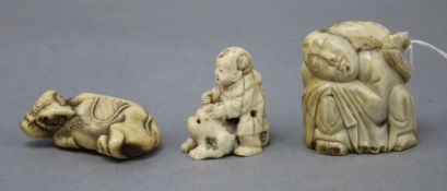 A Japanese staghorn buffalo netsuke and two others