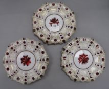 A set of six Bohemian overlay ruby glass plates, overlaid in white and heightened in gilt, each with